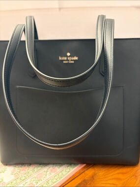 kate spade black leather tote with front slip pocket